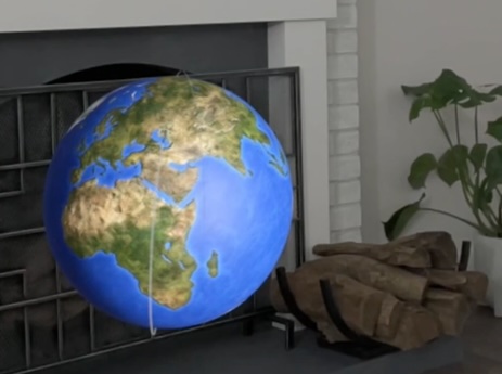 Floating virtual terrestrial globe in a real room
