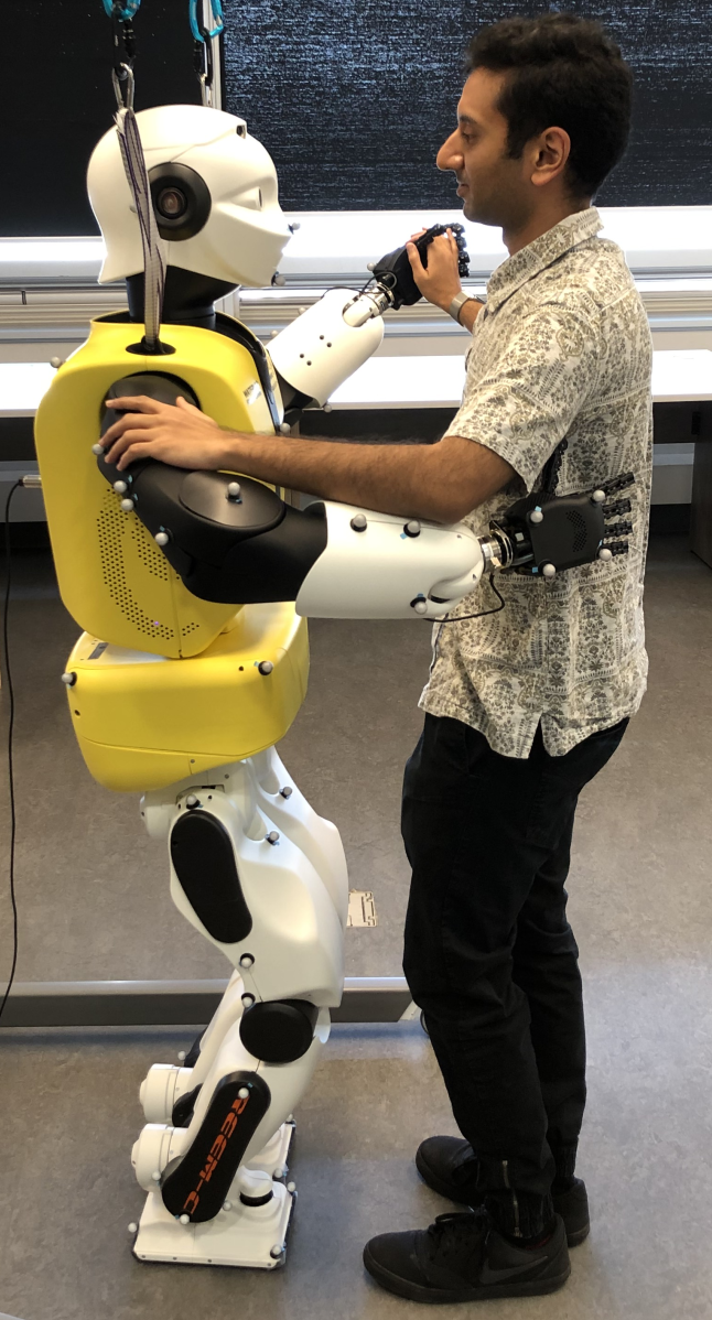 Slow waltzing with REEM-C: a physical-social human-robot interaction study of robot-to-human communication