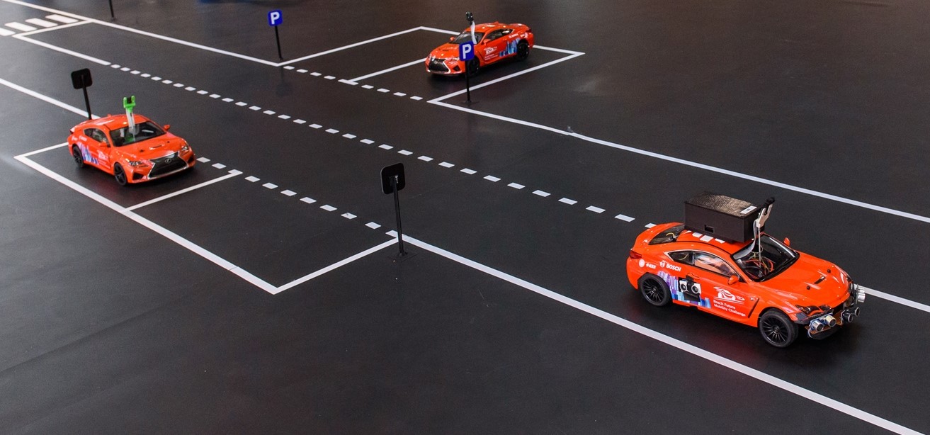 A Sim-to-Real Vision-based Lane Keeping System for a 1:10-scale Autonomous Vehicle