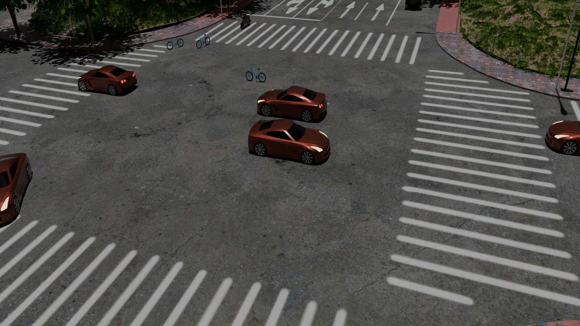 Simulated environment urban intersection with cars navigating through a multi-lane crossing.