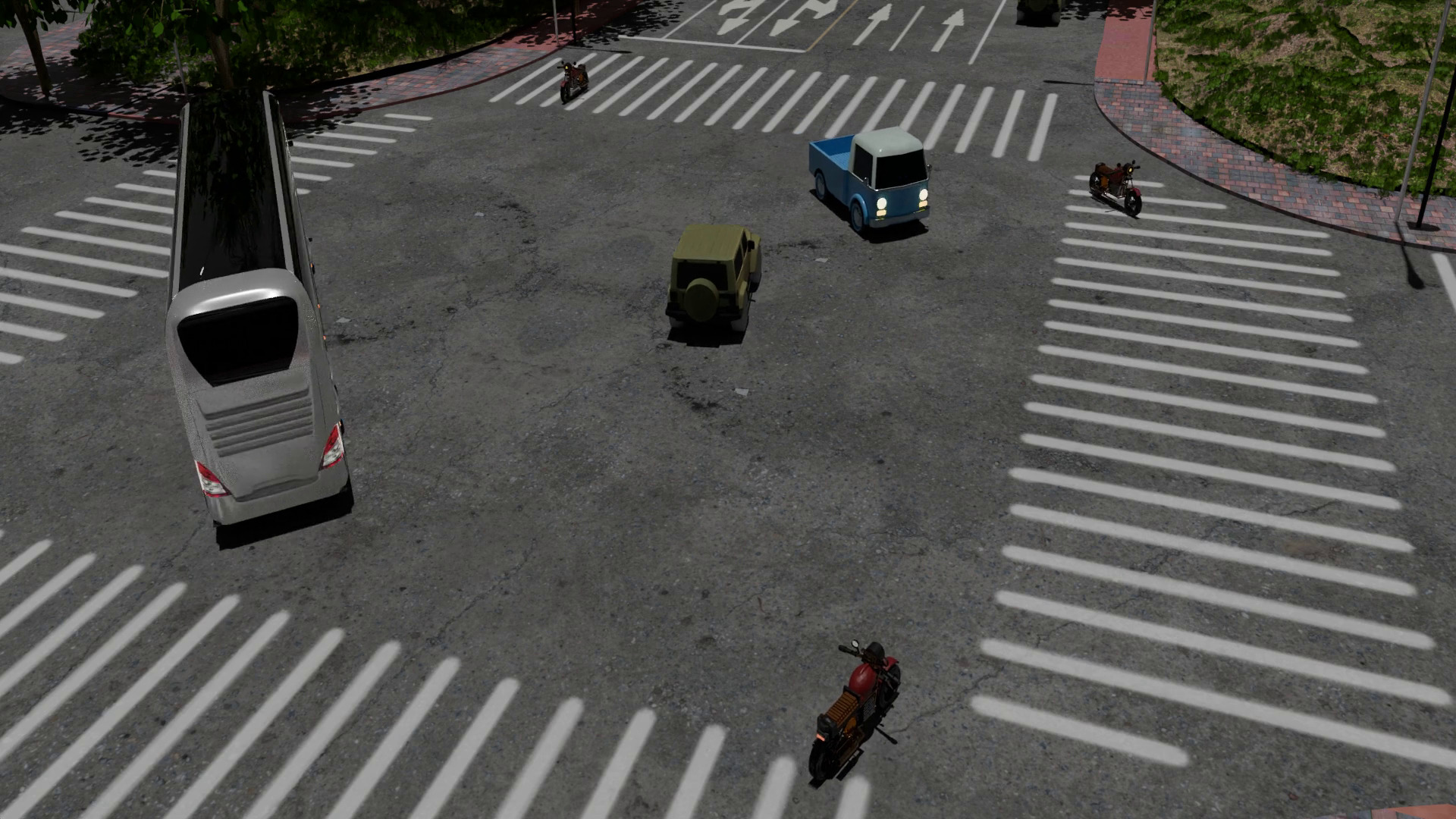 Simulated environment urban intersection with cars, bus, motorcycles navigating through a multi-lane crossing.