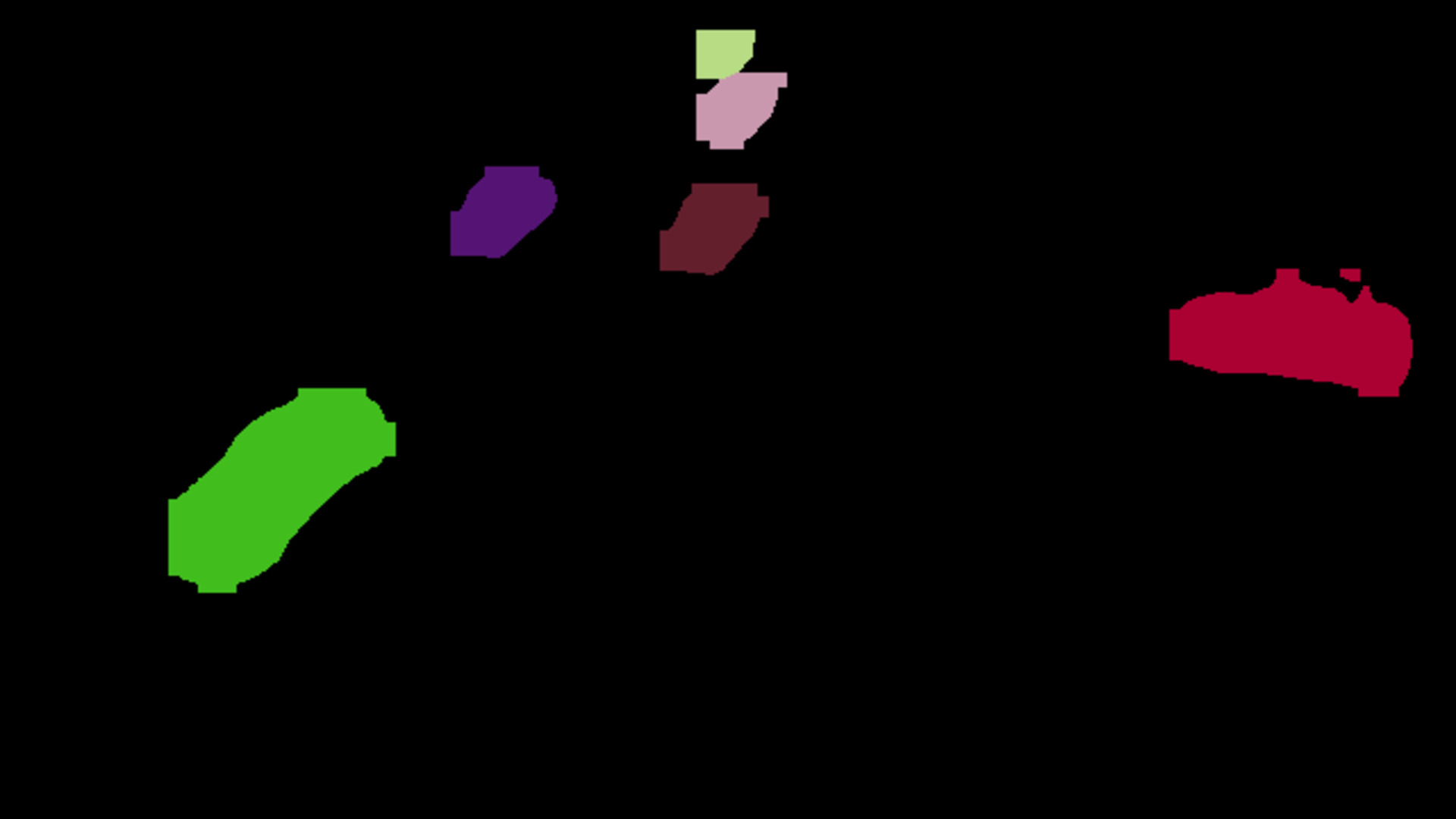 Segmentation mask of urban intersection with cars navigating through a multi-lane crossing.